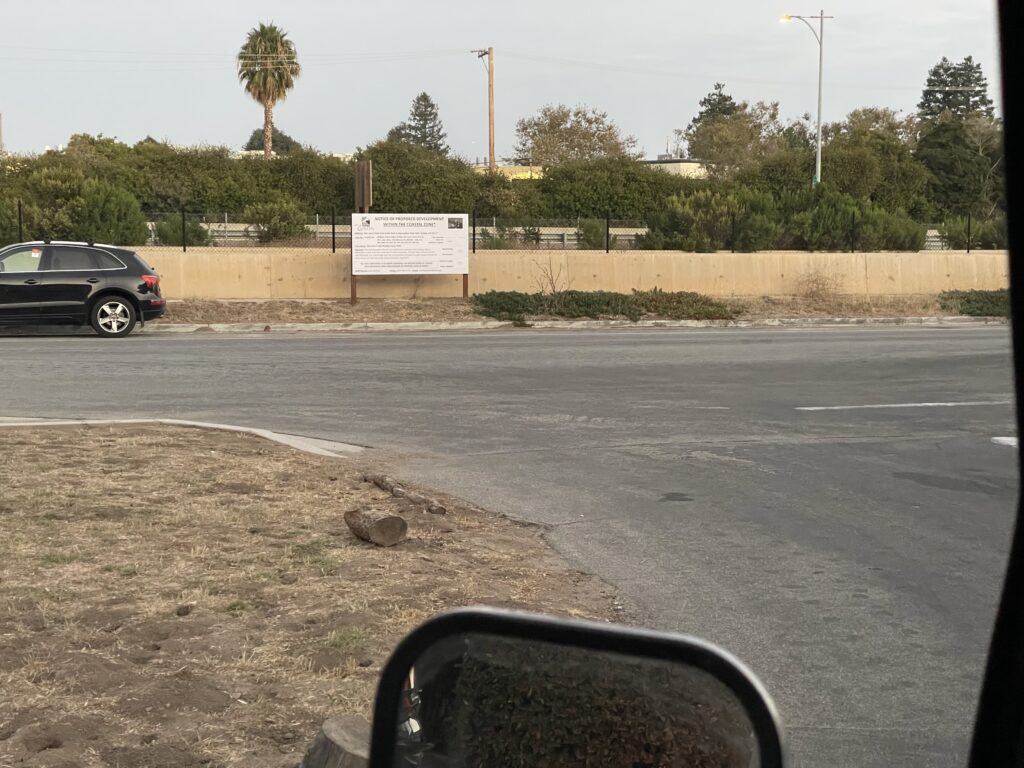 A motorcycle is parked on the side of a road.